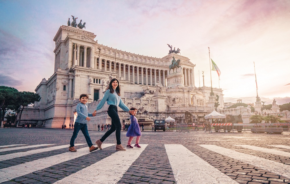 family walking down the street in Rome