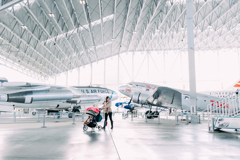 walking around with a stroller in an aviation museum