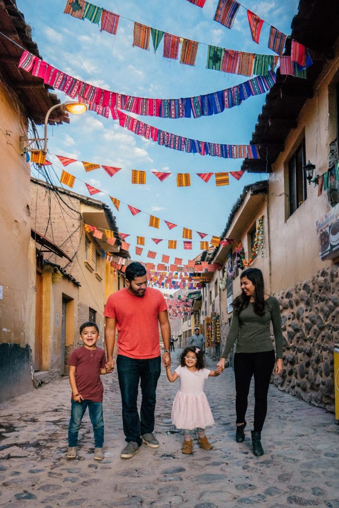 walking down the street in ollantaytambo peru