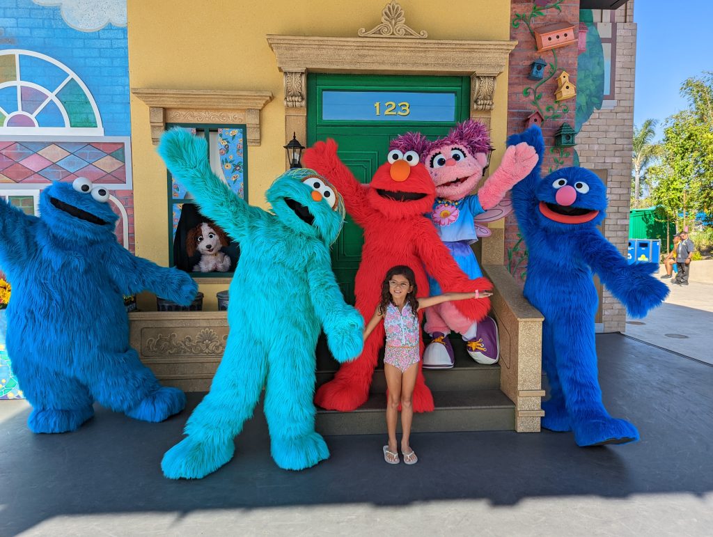 sesame place san diego posing with characters